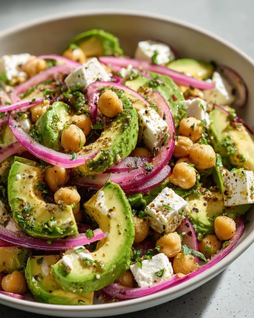 Chickpea Feta Avocado Salad with vibrant vegetables and a zesty dressing